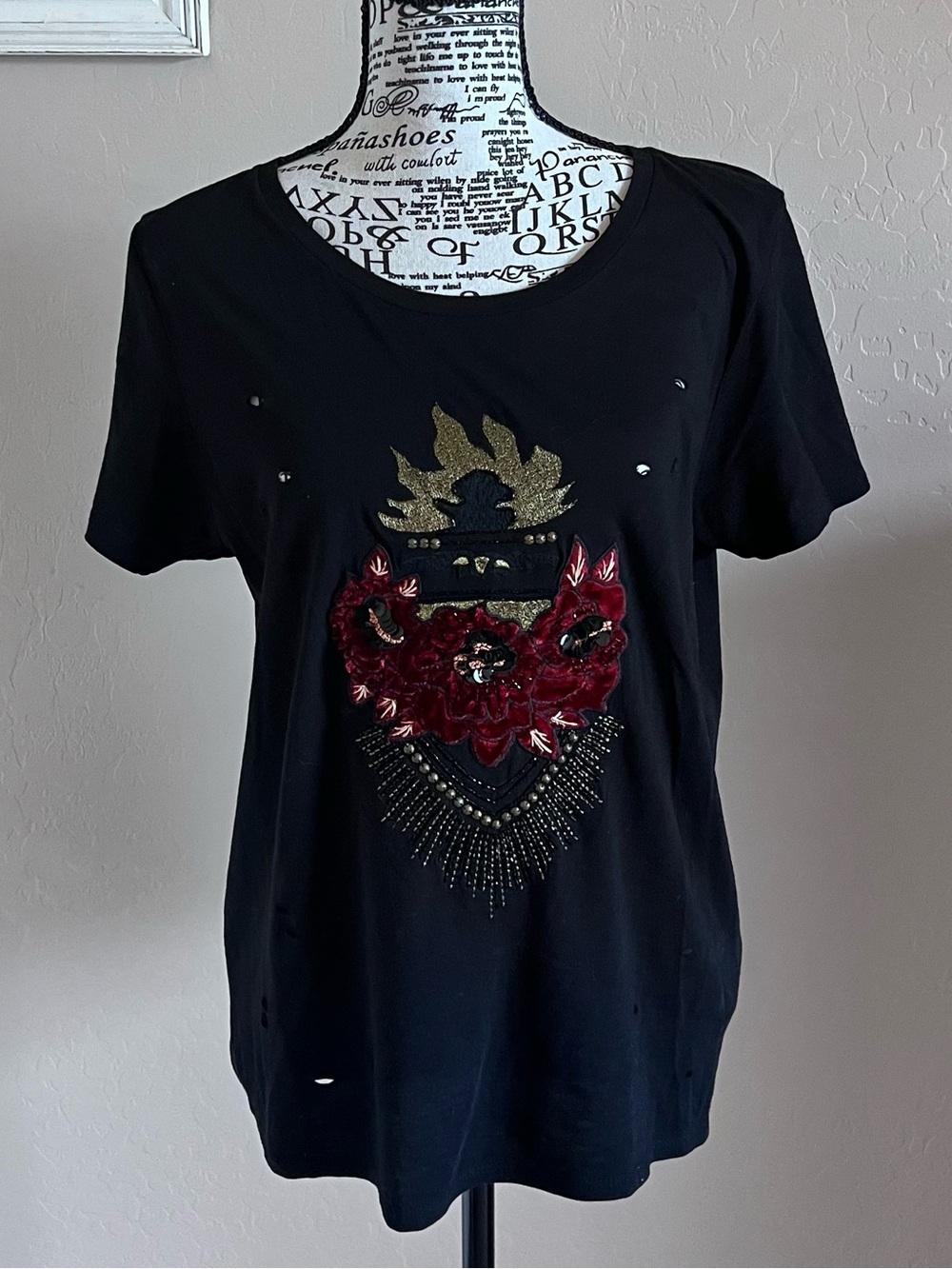 Guess Black Short-Sleeve Tee with Red Floral Applique and Gold Accents